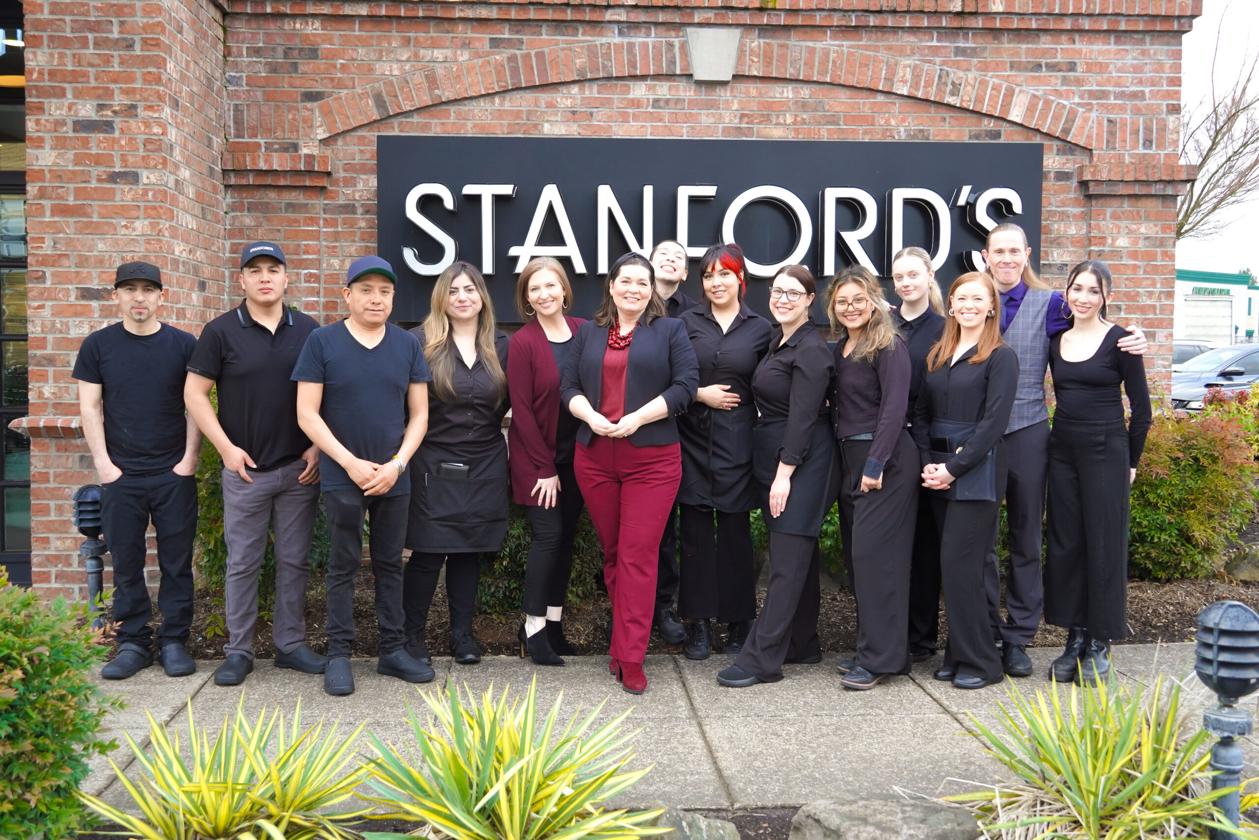 Stanford's team in front of restaurant