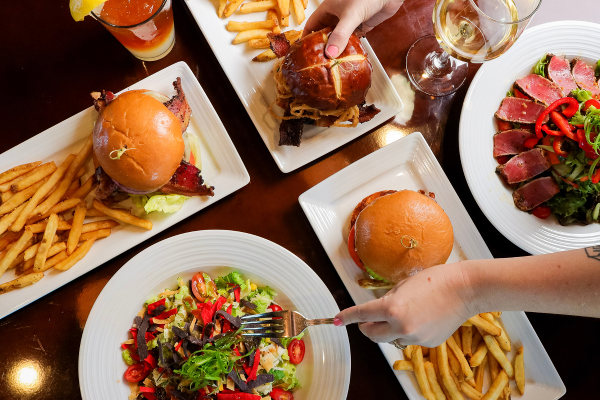 Plating of different American entrees and sides